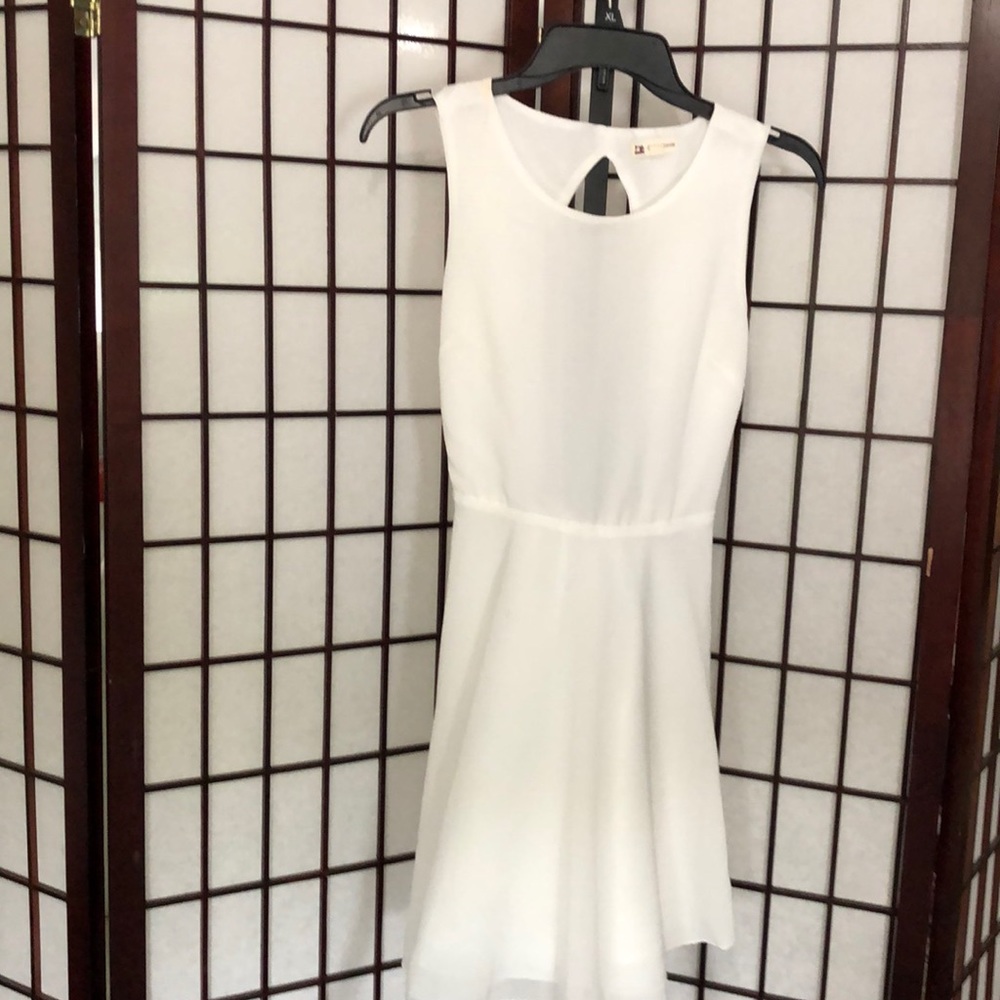 Backless white georgette dress